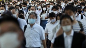 Jepang Akan Turunkan Status Covid Jadi Setara Flu