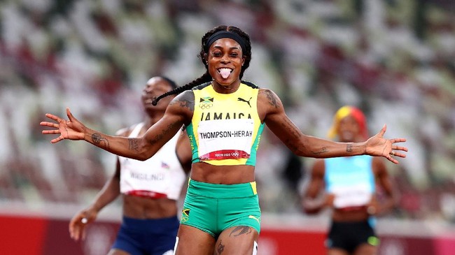 Elaine Thompson-Herah dari Jamaika mencetak sejarah besar sebagai pelari putri pertama yang meraih dua emas dari nomor 100 meter dan 200 meter Olimpiade.
