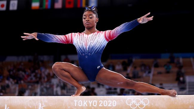 Pesenam artistik Simone Biles kembali bertanding di Olimpiade Tokyo 2020. Dia kembali dengan kilauan di medali perunggu dan leotard bertabur kristal.