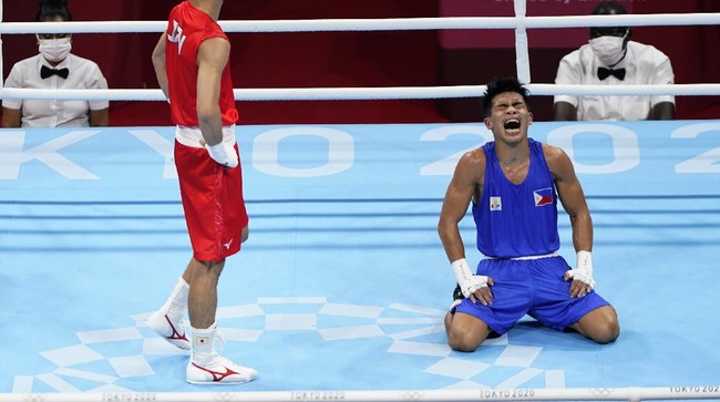 Filipina dipastikan bakal menggeser peringkat Indonesia di Olimpiade Tokyo seiring keberhasilan Carlo Paalam lolos ke final tinju kelas terbang.