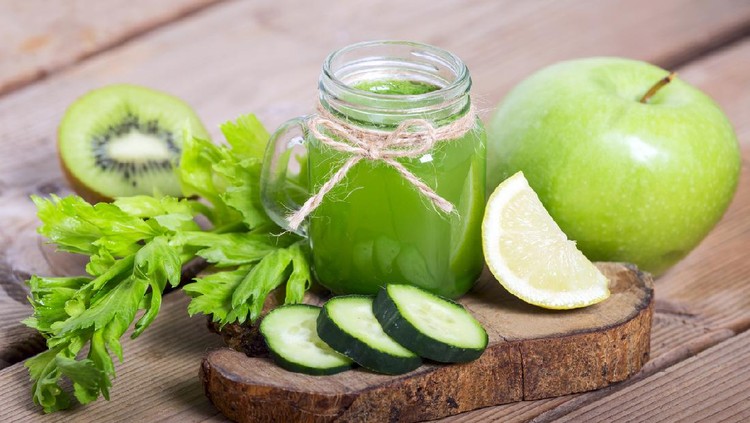 Blended smoothie with ingredients, green apple, cucumber, celery, kiwi on wood background. selective focus.