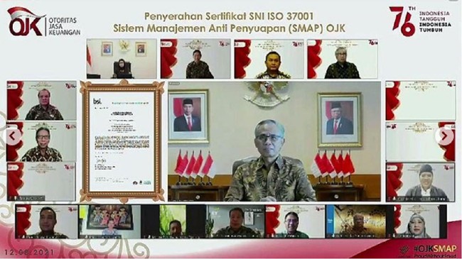 OJK berhasil meraih Sertifikat SNI ISO 37001 Sistem Manajemen Anti Penyuapan (SMAP) dan berharap pencapaian ini diikuti seluruh pelaku industri jasa keuangan.