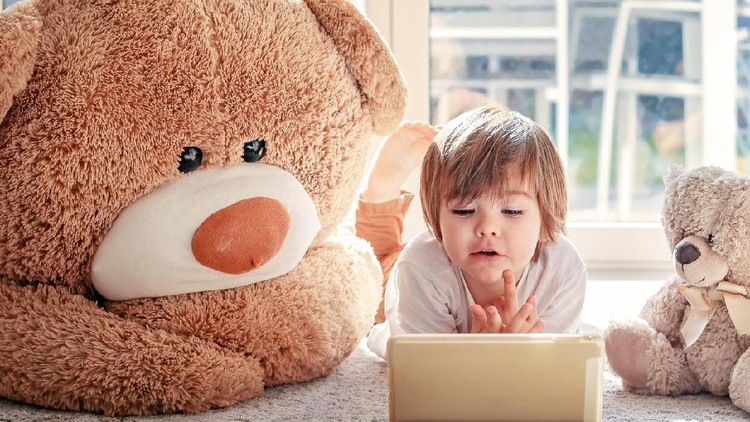 anak main gadget Asian girl watch video or play mobile game happily by cell phone