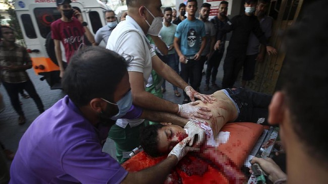 FOTO: Israel Tembaki Demonstran Palestina di Gaza