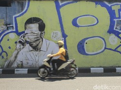 Mural Pria Mirip Jokowi Mata Tertutup Masker Hiasi Jalan di Bandung