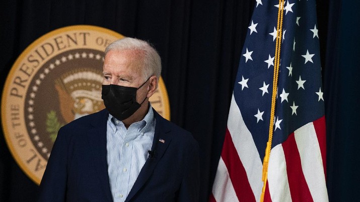 President Joe Biden arrives for a FEMA briefing on Hurricane Ida in the South Court Auditorium in the Eisenhower Executive Office Building on the White House Campus, Saturday, Aug. 28, 2021, in Washington. (AP Photo/Manuel Balce Ceneta)