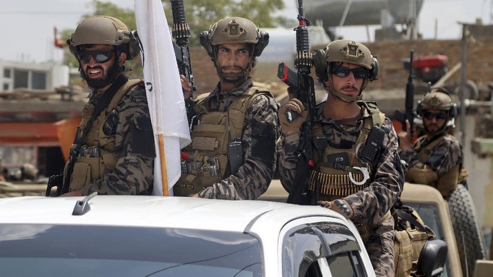 Taliban special force fighters arrive inside the Hamid Karzai International Airport after the U.S. military's withdrawal, in Kabul, Afghanistan, Tuesday, Aug. 31, 2021. The Taliban were in full control of Kabul's international airport on Tuesday, after the last U.S. plane left its runway, marking the end of America's longest war. (AP Photo/Khwaja Tawfiq Sediqi)