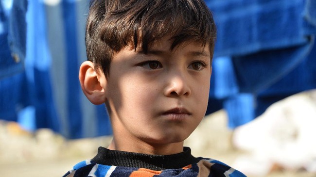 Murtaza Ahmadi, bocah Afghanistan meminta tolong diselamatkan Lionel Messi karena takut dengan pasukan Taliban.