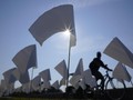 FOTO: Hamparan Bendera Putih, Simbol Duka AS Diterpa Covid-19