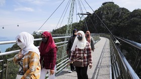 Masuk New Normal, Malaysia Izinkan Warga Divaksin Pergi ke LN