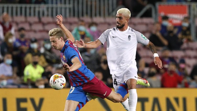Barcelona bermain imbang 1-1 dengan Granada di Stadion Camp Nou dalam lanjutan Liga Spanyol pekan ke , Selasa (21/9) dini hari waktu Indonesia.