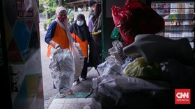FOTO: Dongkrak Ekonomi Warga dengan Bank Sampah