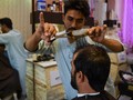 FOTO: Taliban Larang Pria Punya Gaya Rambut Modern