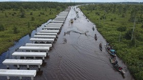 FOTO: Jalan Trans Kalimantan Bukit Rawi Terendam Banjir