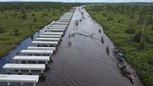 FOTO: Jalan Trans Kalimantan Bukit Rawi Terendam Banjir