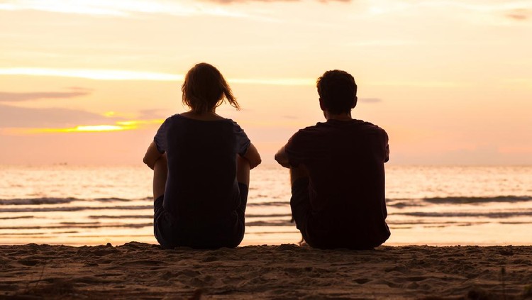 Photo of romatic couple hands, walking outdoor and spending time together