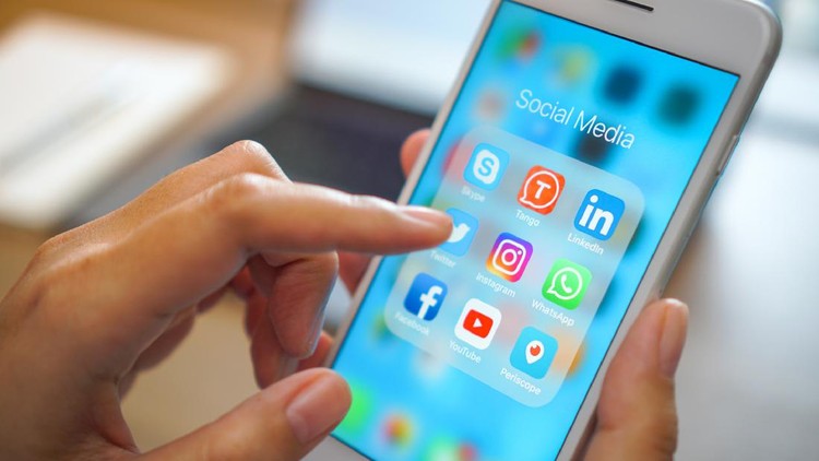 Bangkok, Thailand - JUN 18, 2018: social medial app iPhone mobile phone with blue screen background technology business smartphone digital communication facebook and internet editorial