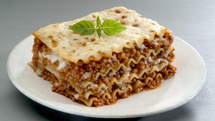 lasagna Traditional Italian pasta, lasagna is made with minced beef bolognese sauce with tomato, basil, and Mozzarella cheese.