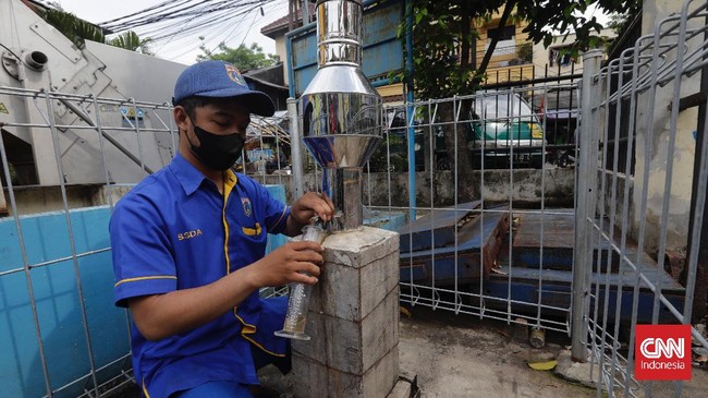 FOTO: Gegas Pasukan Biru Antisipasi Banjir Jakarta
