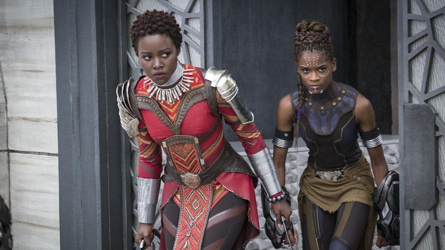 This image released by Disney shows Lupita Nyong'o, left, and Letitia Wright in a scene from Marvel Studios' 