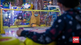 Rangkuman Covid: Nihil Zona Merah hingga Target Vaksin Jokowi
