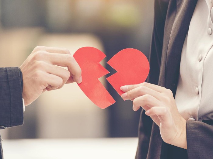 Grief divorce couple holding broken heart. Unhappy relationship hurt feeling for lover. valentine concept.