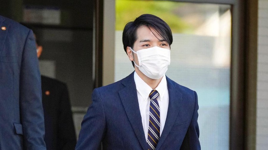 Kei Komuro, fiance of Japan's Princess Mako, leaves his family home for Akasaka Estate to meet her parents Crown Prince Akishino and Crown Princess Kiko in Yokohama, south of Tokyo, Monday, Oct. 18, 2021. Komuro, who returned to Japan from New York where he was studying to become a lawyer, and Princess Mako will get married on Oct. 26. (Kyodo News via AP)