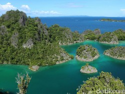 13 Tempat Wisata di Papua yang Memukau dan Wajib Dikunjungi