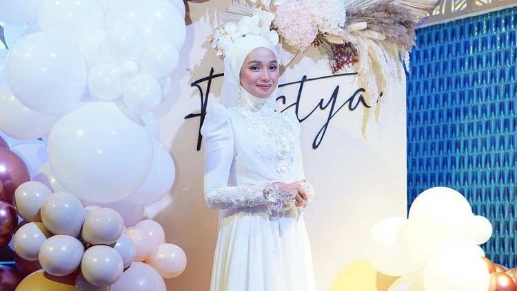 Tya Arifin dan suami