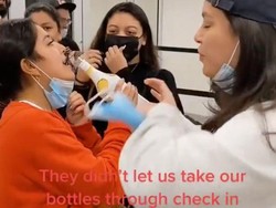 Kelebihan Bawa Miras, Turis Ini Ajak Seisi Bandara untuk Minum Bareng