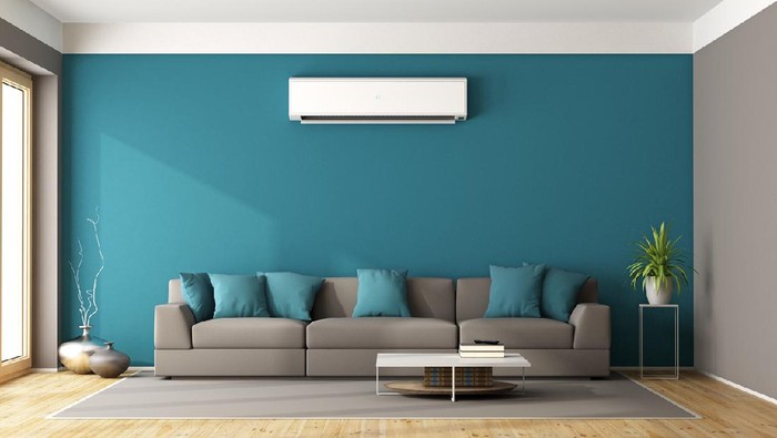 Modern living room with sofa and air conditioner - 3d rendering