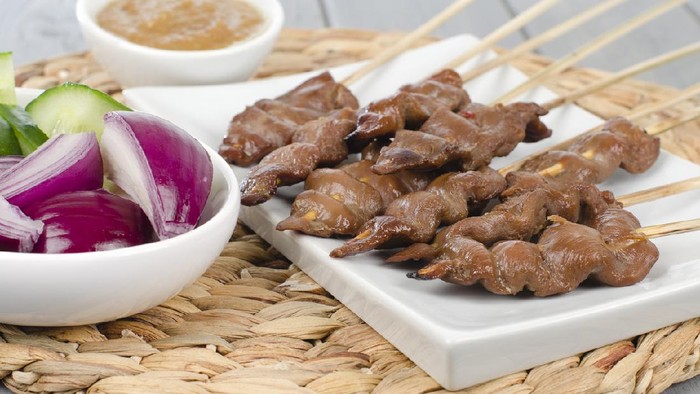 Duck Satay with peanut sauce.
