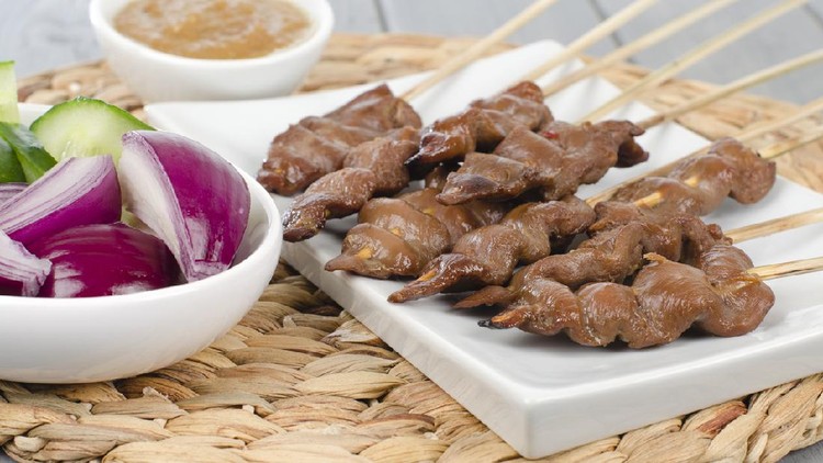 Duck Satay with peanut sauce.
