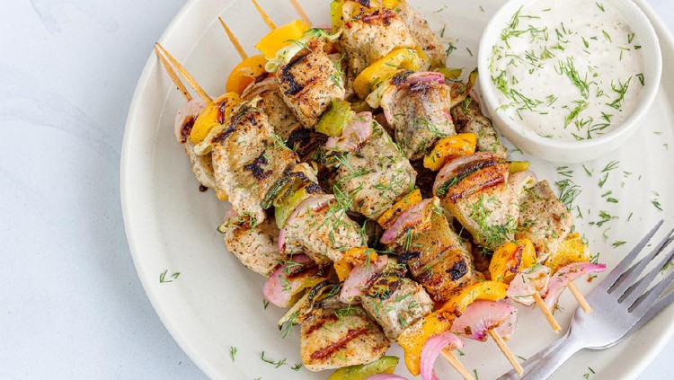 sate ikan Grilled Fish Tikka, Fish Appetizer with Condiment Garnished with Fresh Dill on White Background