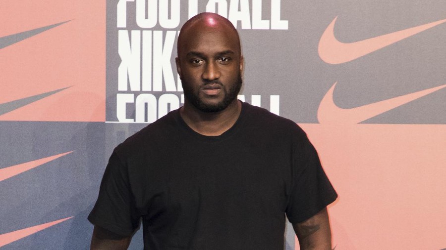FILE - Virgil Abloh poses for photographers upon arrival at the Nike Celebrates The Beautiful Game event, in London on Wednesday, Feb. 7, 2018.  Abloh, a leading fashion executive hailed as the Karl Lagerfeld of his generation, has died after a private battle with cancer. He was 41. Abloh’s death was announced Sunday, Nov. 28, 2021 by LVMH Louis Vuitton and the Off White label, the brand he founded.  (AP Photo/Vianney Le Caer/File)