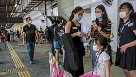Singapura Gratiskan Obat Covid Anak hingga Junta Myanmar Ancam Warga