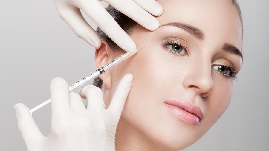 Girl receiving hyaluronic acid treatment