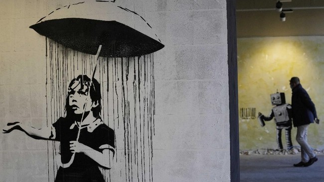 FOTO: Mural Jalanan Banksy Dibuat Ulang di Stasiun Kereta Milan