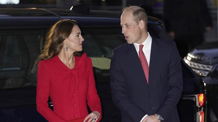 Britain's Prince William and Kate, Duchess of Cambridge, arrive for the Together At Christmas community carol service at Westminster Abbey in London, Wednesday, Dec. 8, 2021. (Stefan Rousseau/PA via AP)