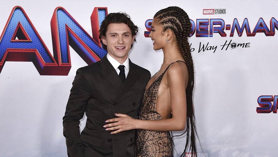 Tom Holland, left, and Zendaya arrive at the premiere of 