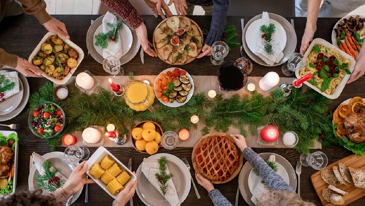 December 24, 2020 - Warsaw, Poland: festive Christmas meal dinner table setting for four people. Real life homemade food.
