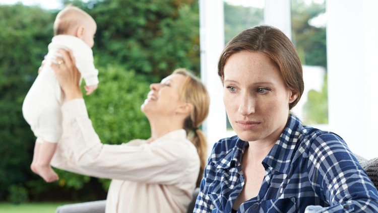 Sad Woman Jealous Of Friend With Young Baby
