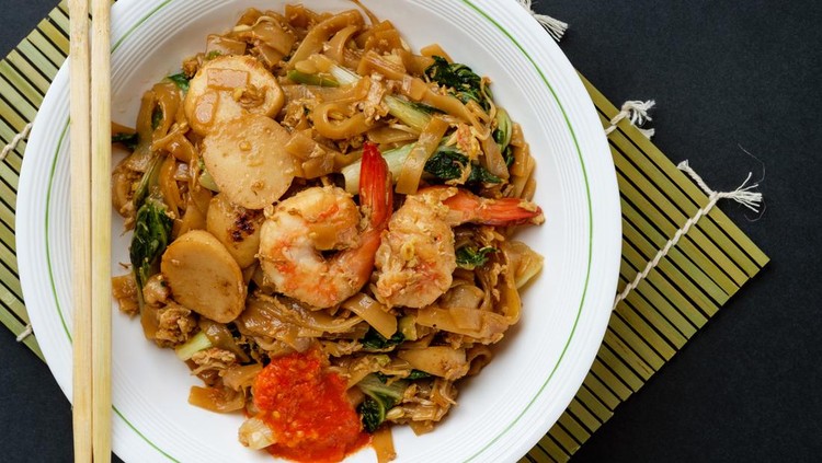 kwetiau goreng Stir fried flat rice noodle which is famous among Indonesian, Malaysian and Singapore
