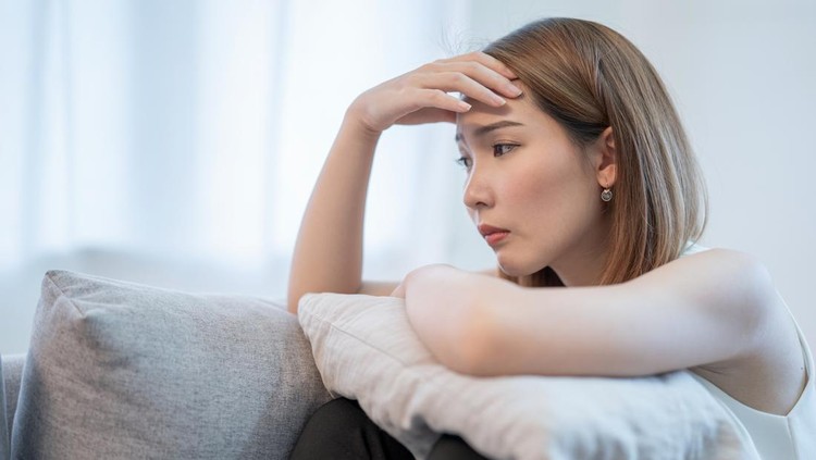Asian women with stress, She kept herself alone in her bedroom, Depression.
