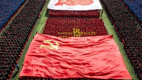 Bagaimana Partai Komunis Bisa 73 Tahun Berkuasa di China?