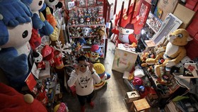 FOTO: Fan Fanatik Olimpiade China, Punya 5.000 Souvenir Asli