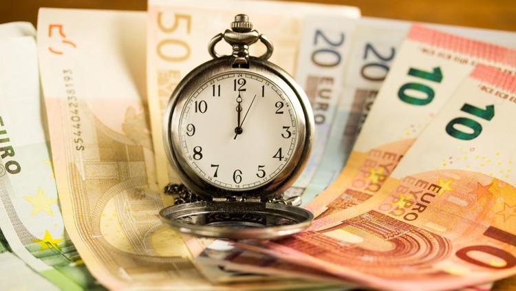 compass and fifty euro banknotes background business and finance concepts