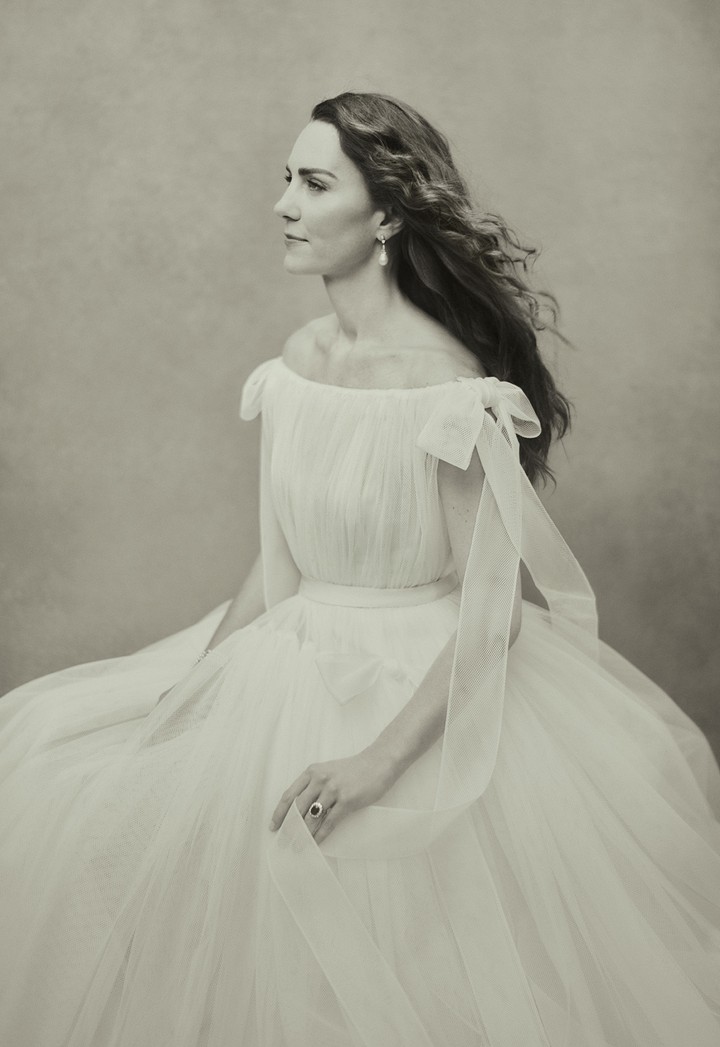 This image made available by Kensington Palace on Saturday Jan. 8, 2022, shows Britain's Kate, Duchess of Cambridge who celebrates her 40th birthday on Sunday Jan. 9., in one of three new photographic portraits. Taken at Kew Gardens in Nov. 2021 by photographer Paolo Roversi, the portraits will enter the permanent Collection of the National Portrait Gallery, of which The Duchess is Patron. (Paolo Roversi/Kensington Palace via AP)