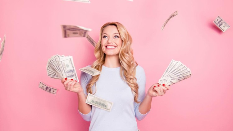 ilustrasi shio Portrait of pretty charming positive cute successful lucky cheerful girl standing under shower from money having a lot of money in hands isolated on pink background