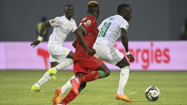 Senegal memastikan satu tiket ke babak 16 besar Piala Afrika 2022 meski hanya bermain imbang 0-0 lawan Malawi pada laga pamungkas Grup B.